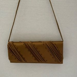 Jessica McClintock Women’s evening handbag.